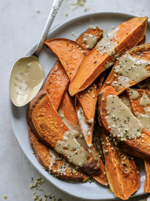 Hemp Seed-Sprinkled Baked Sweet Potato Fries with Lemon Tahini Dressing